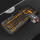 黒のオレンジ色のキーボード+カスタムゲームのマウス